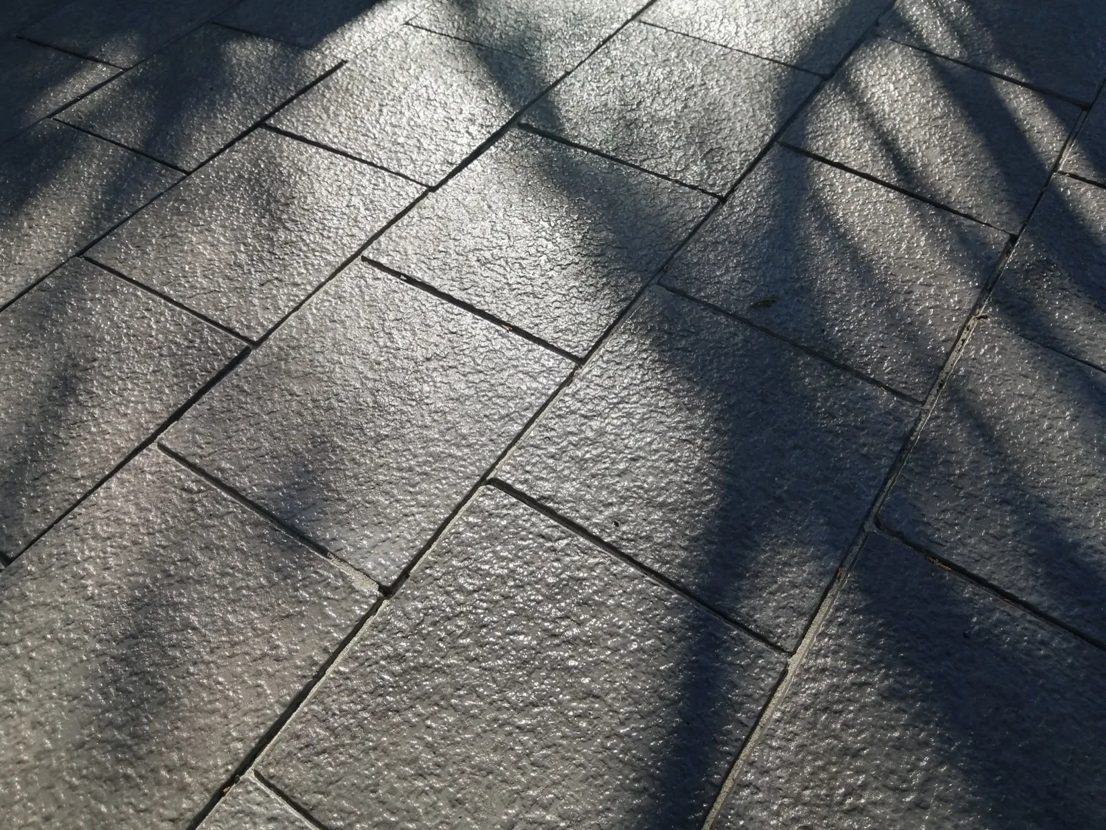 CAPECAST paving textures — charcoal and grey finishes